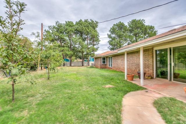 view of yard with a patio area