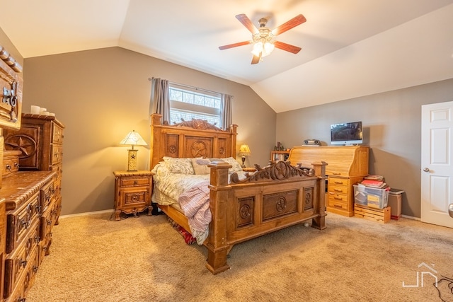 bedroom featuring light carpet, baseboards, vaulted ceiling, and ceiling fan