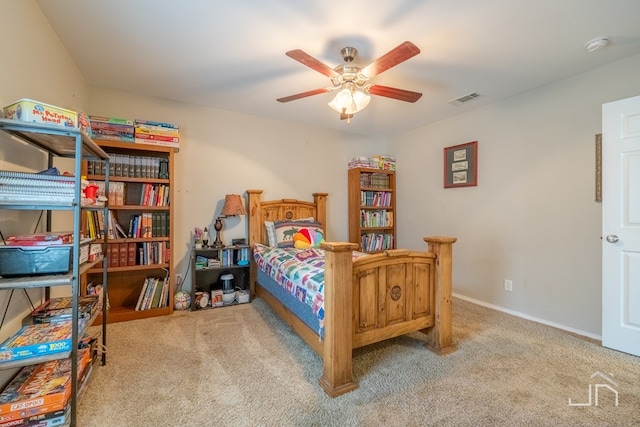 bedroom with baseboards, visible vents, ceiling fan, and carpet floors