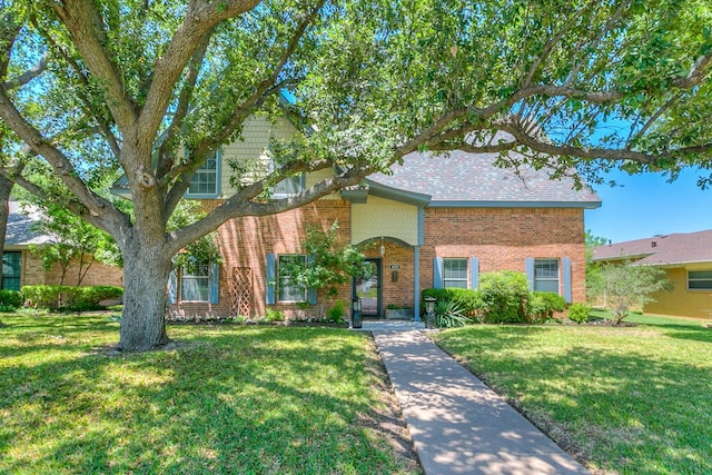 4929 Bermuda Dr, San Angelo, TX 76904 - view of front of home featuring brick siding and a front lawn