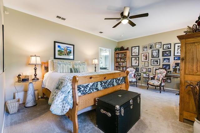 4929 Bermuda Dr, San Angelo, TX 76904 - carpeted bedroom with crown molding and a ceiling fan