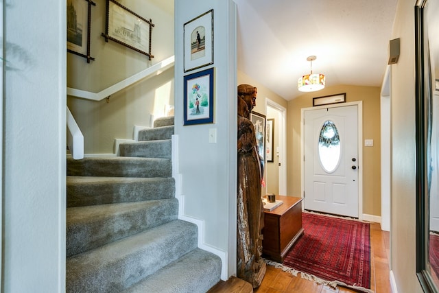 4929 Bermuda Dr, San Angelo, TX 76904 - entrance foyer with wood finished floors, stairway, and vaulted ceiling