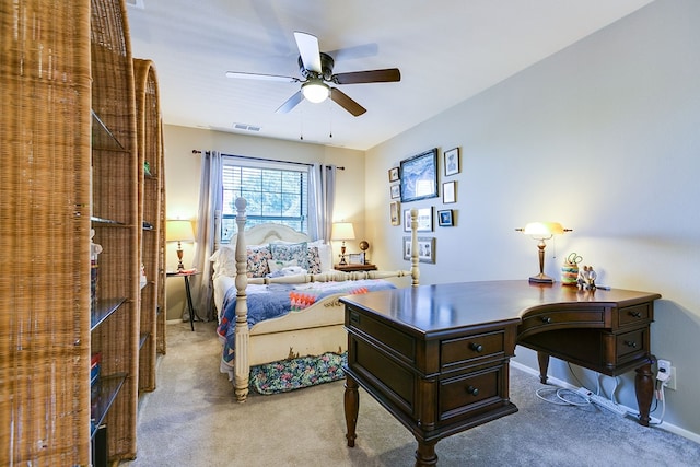 4929 Bermuda Dr, San Angelo, TX 76904 - carpeted bedroom with ceiling fan and a desk