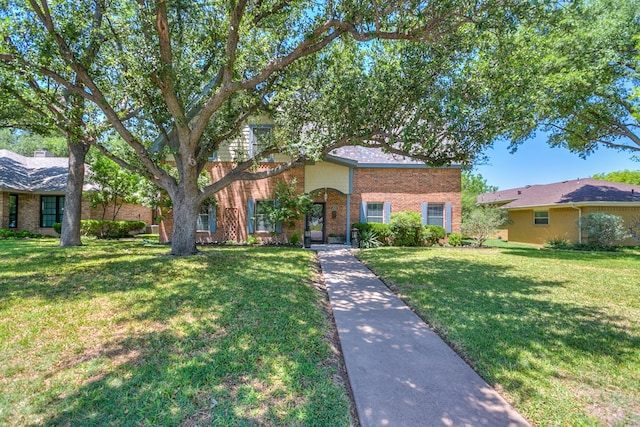 4929 Bermuda Dr, San Angelo, TX 76904 - view of front of property with brick siding and a front lawn
