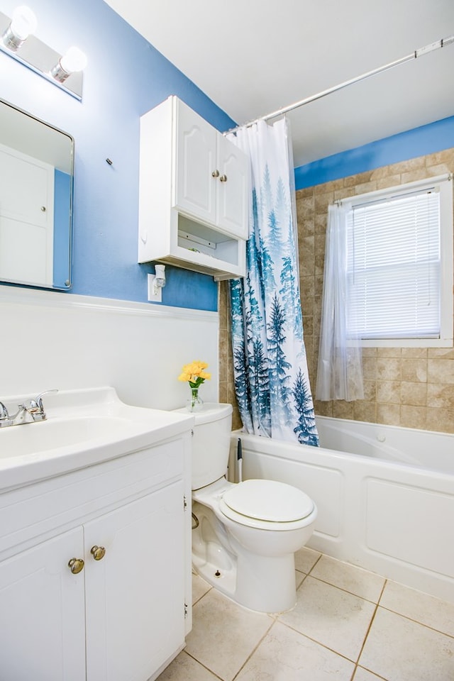 2609 W Harris Ave, San Angelo, TX 76901 - full bath with vanity, tile patterned floors, and shower / tub combo