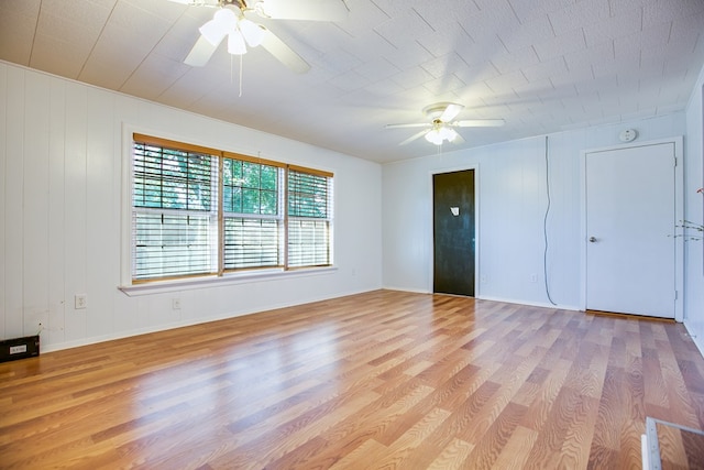 2609 W Harris Ave, San Angelo, TX 76901 - unfurnished bedroom featuring light wood-style floors and ceiling fan