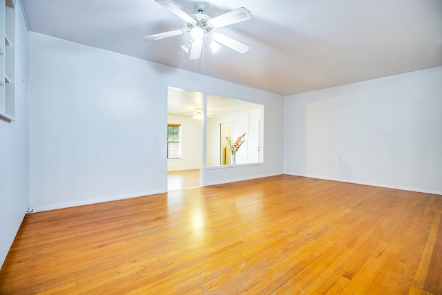 2609 W Harris Ave, San Angelo, TX 76901 - empty room with a ceiling fan and light wood finished floors