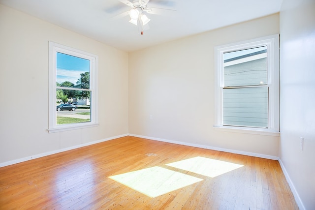 2609 W Harris Ave, San Angelo, TX 76901 - empty room featuring light wood-style flooring and a ceiling fan