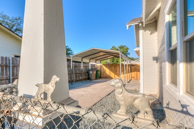 view of patio / terrace featuring a carport