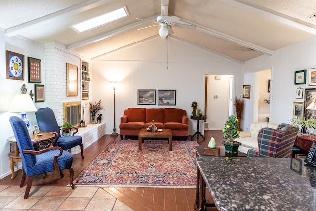 living area with lofted ceiling with beams, visible vents, and a ceiling fan