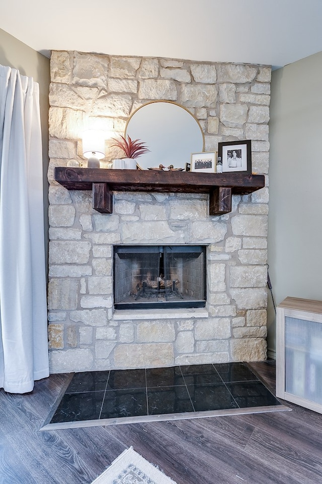 2873 Joshua St, San Angelo, TX 76905 - detailed view of wood finished floors and a stone fireplace