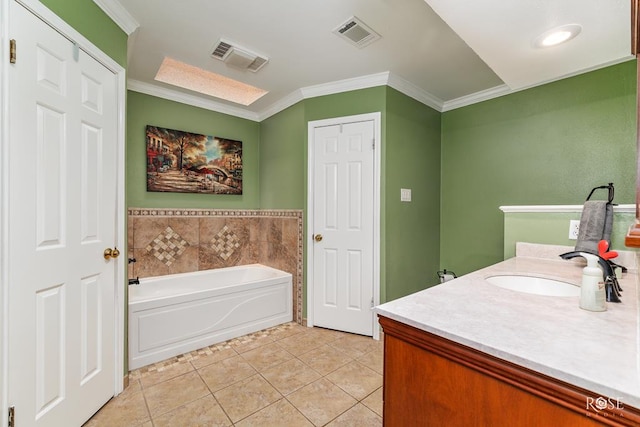 full bath featuring tile patterned flooring, visible vents, a garden tub, and crown molding