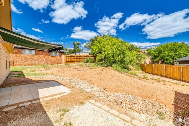 view of yard with a patio