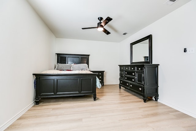 bedroom featuring light hardwood / wood-style flooring and ceiling fan