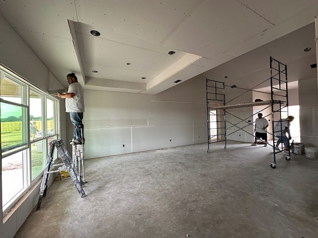 interior space featuring concrete floors and a healthy amount of sunlight