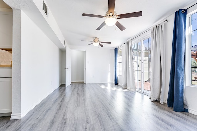 spare room featuring light hardwood / wood-style floors