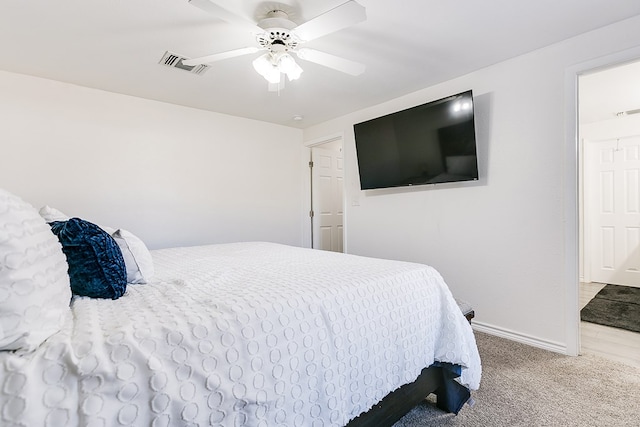 bedroom featuring ceiling fan and carpet flooring