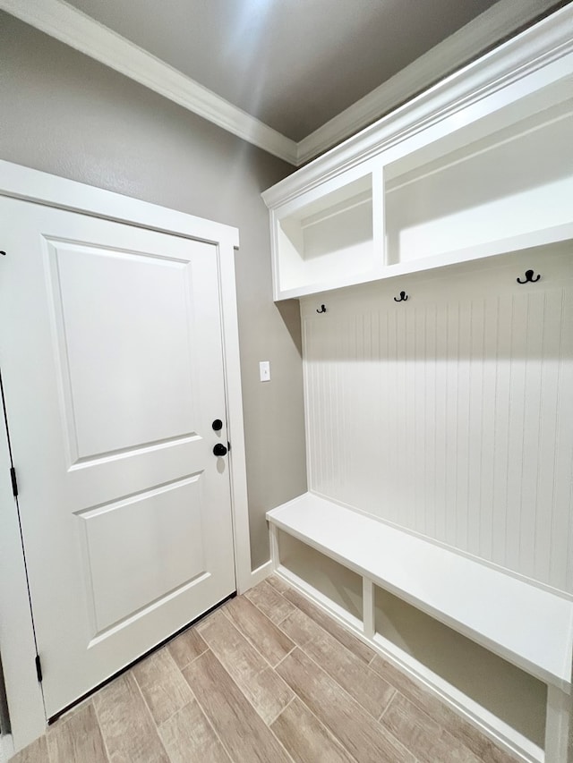 3962 Ruth Ln, San Angelo, TX 76904 - mudroom featuring wood tiled floors and ornamental molding