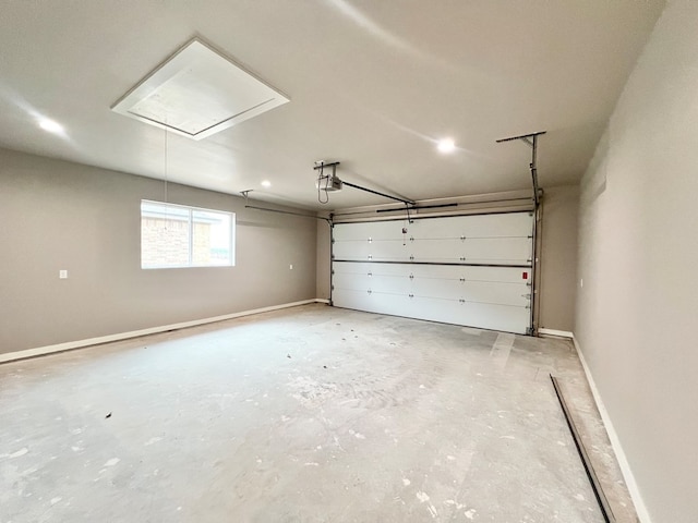 3962 Ruth Ln, San Angelo, TX 76904 - garage featuring baseboards and a garage door opener