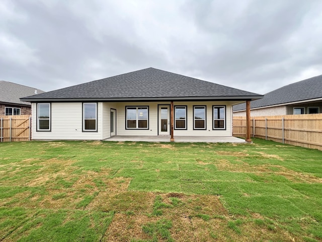3962 Ruth Ln, San Angelo, TX 76904 - back of property with a patio and a shingled roof
