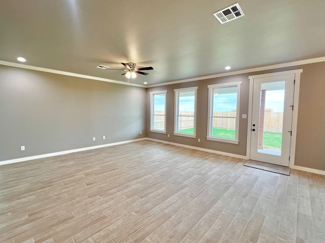 3962 Ruth Ln, San Angelo, TX 76904 - empty room featuring crown molding, light wood-style flooring, baseboards, a ceiling fan, and recessed lighting
