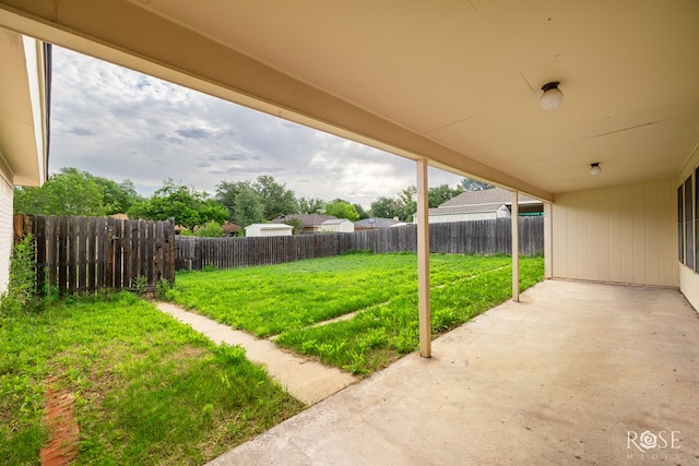 view of yard featuring a fenced backyard and a patio