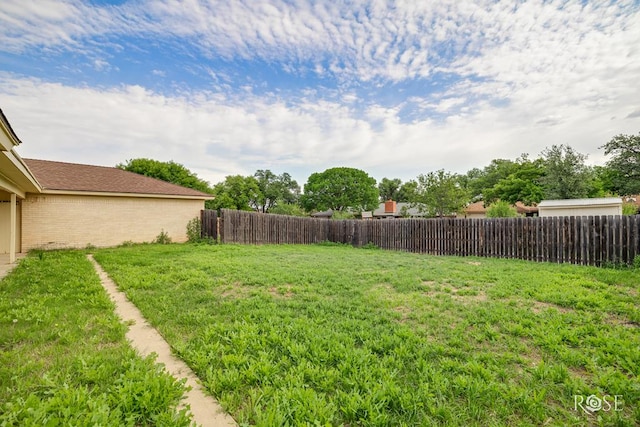view of yard featuring fence
