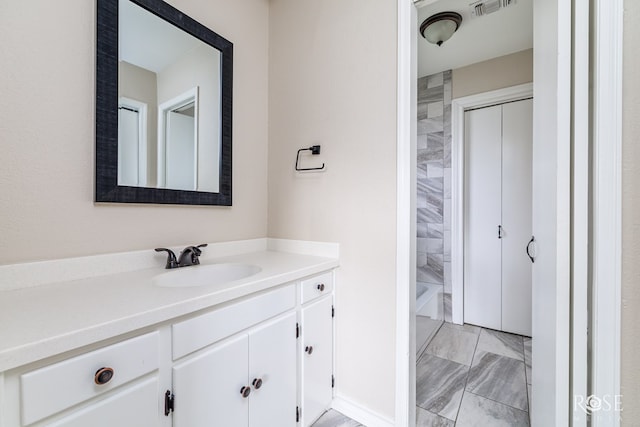 full bathroom with vanity, visible vents, shower / bathtub combination, and marble finish floor