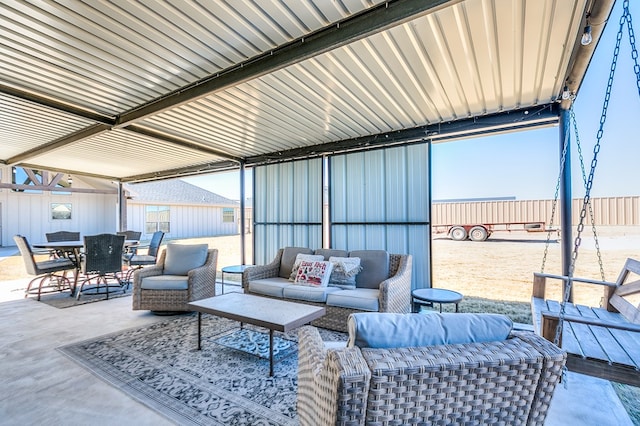 view of patio featuring outdoor dining area and an outdoor hangout area