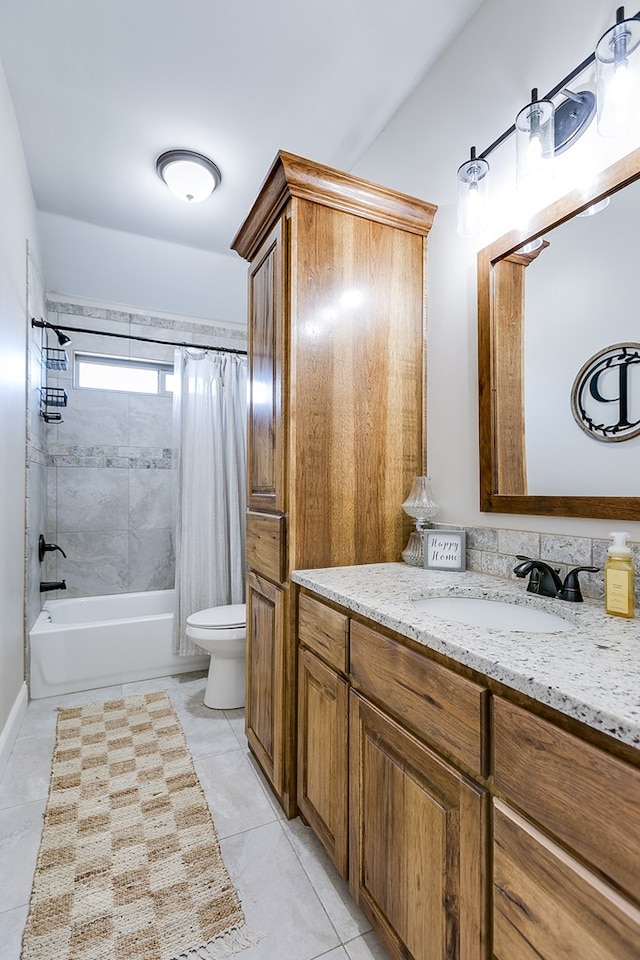 bathroom with toilet, tile patterned floors, shower / tub combo with curtain, and vanity