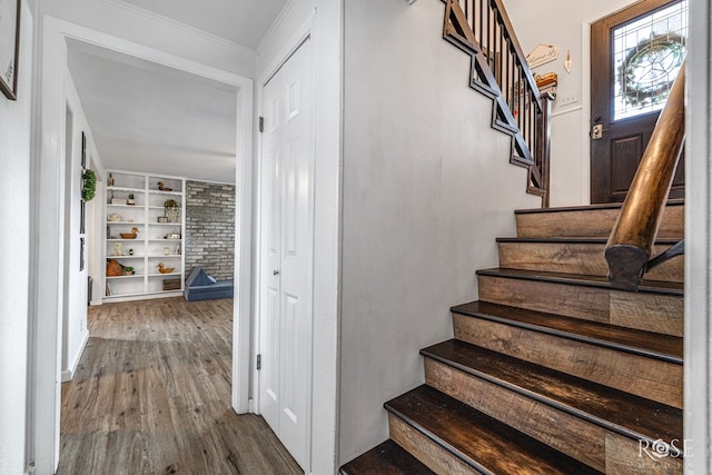 2113 Sul Ross St, San Angelo, TX 76904 - staircase featuring wood finished floors and built in features