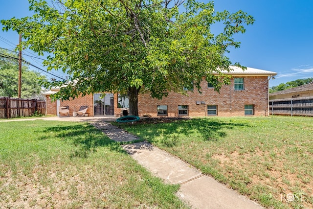 2113 Sul Ross St, San Angelo, TX 76904 - back of property featuring brick siding