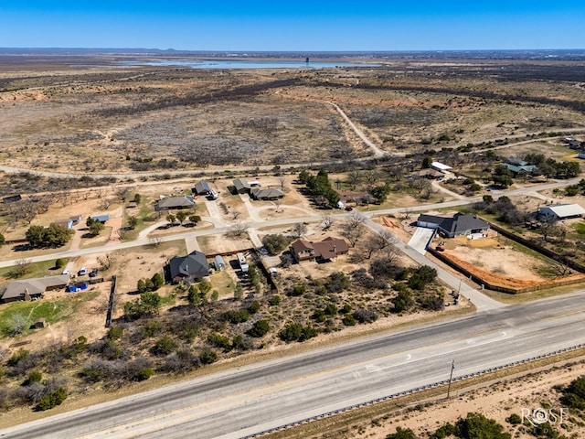 aerial view featuring a desert view