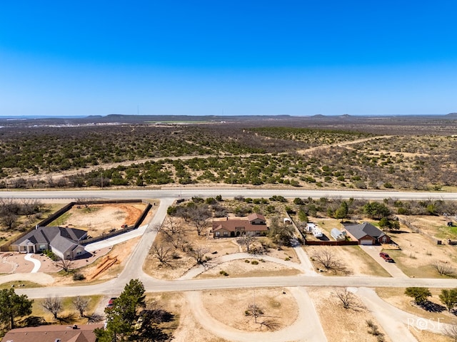 bird's eye view featuring a desert view and a mountain view