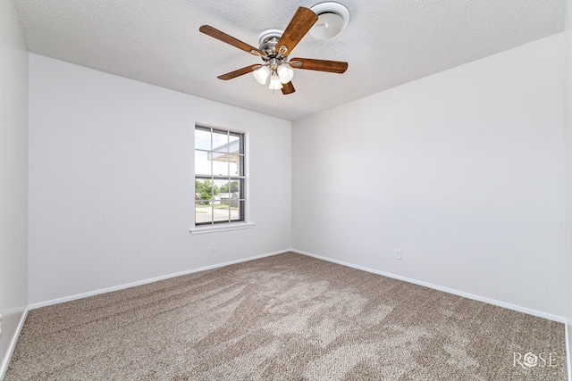 2109 Dartmouth Dr, San Angelo, TX 76904 - empty room with carpet flooring, a ceiling fan, baseboards, and a textured ceiling