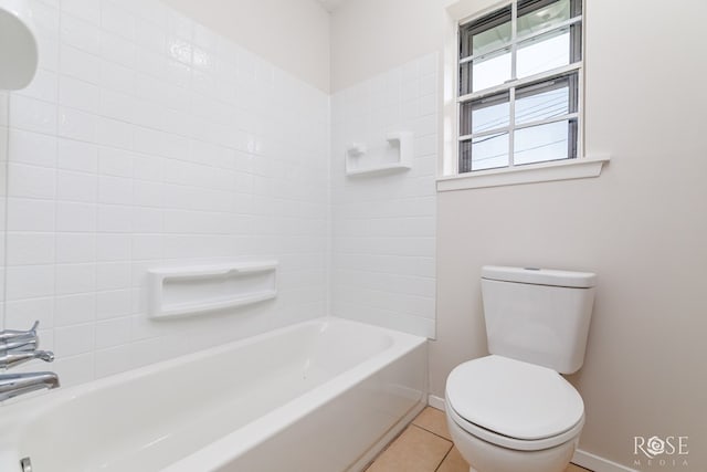 2109 Dartmouth Dr, San Angelo, TX 76904 - full bath featuring toilet, baseboards, tile patterned flooring, and shower / bathtub combination