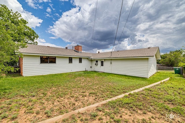 2109 Dartmouth Dr, San Angelo, TX 76904 - rear view of house with a chimney