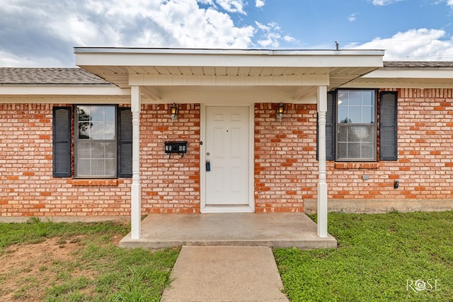 2109 Dartmouth Dr, San Angelo, TX 76904 - doorway to property featuring brick siding