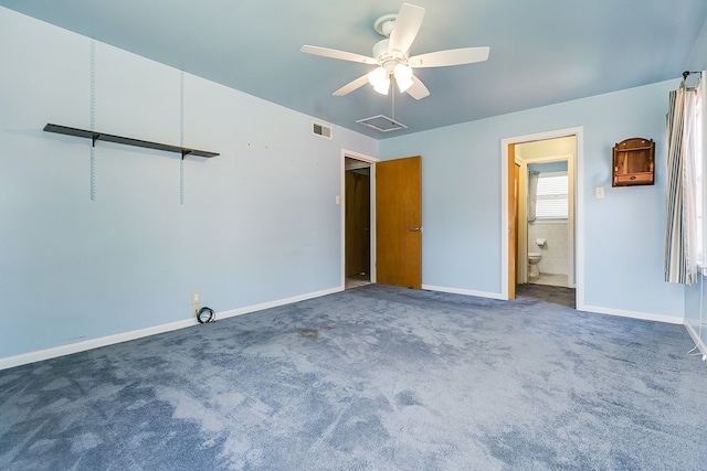 2650 Rice Ave, San Angelo, TX 76904 - unfurnished bedroom with carpet flooring, baseboards, a ceiling fan, and ensuite bath