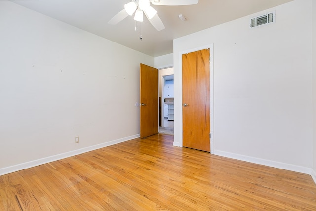 2650 Rice Ave, San Angelo, TX 76904 - unfurnished room with a ceiling fan, light wood-type flooring, and baseboards