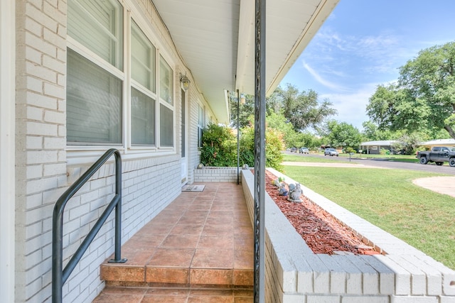 2650 Rice Ave, San Angelo, TX 76904 - covered porch with a yard
