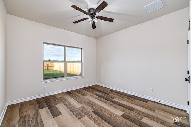 5034 Scarlet Oak Ln, San Angelo, TX 76904 - empty room with wood finished floors, baseboards, and a ceiling fan