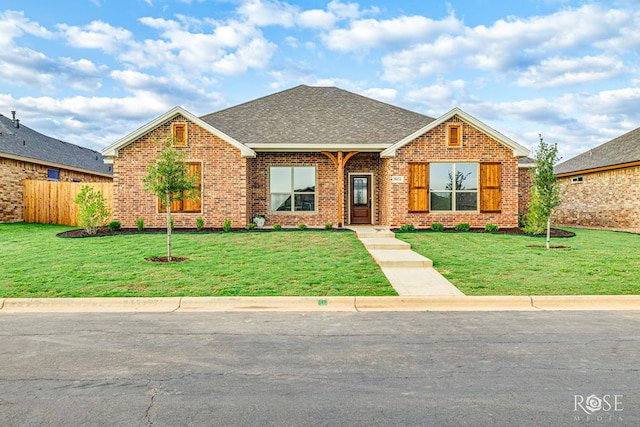 5034 Scarlet Oak Ln, San Angelo, TX 76904 - traditional-style house with brick siding and a shingled roof