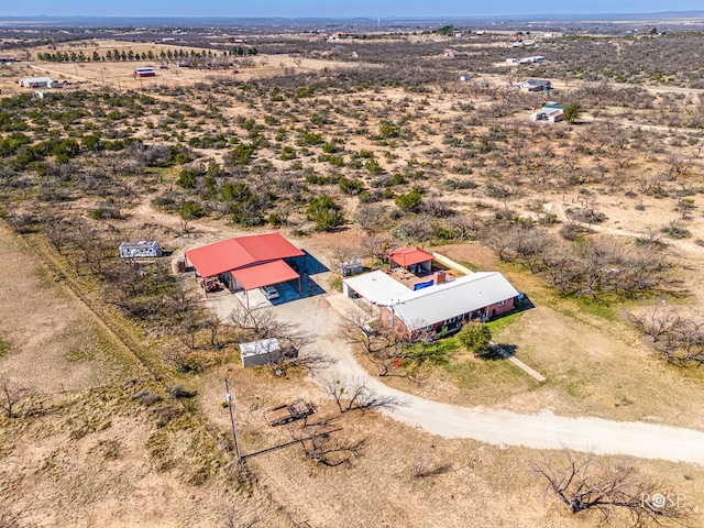 birds eye view of property featuring a rural view