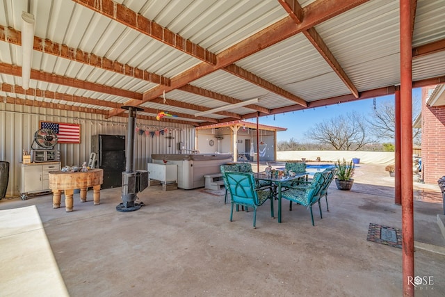 view of patio with a hot tub