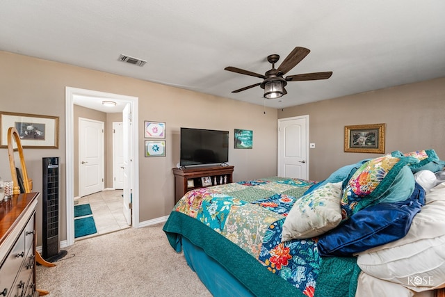 carpeted bedroom featuring ceiling fan