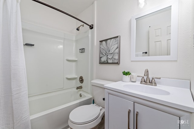 full bathroom with vanity, shower / bath combination with curtain, and toilet