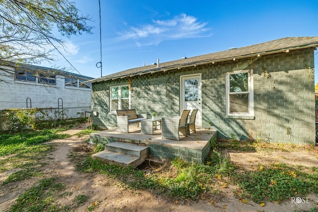 back of property featuring a patio area