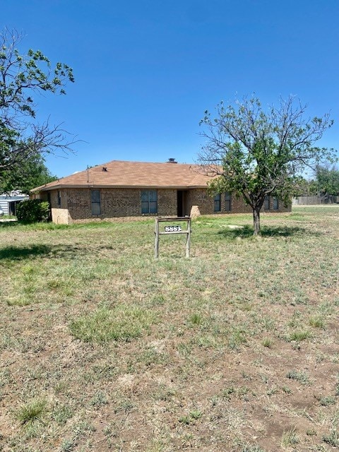 8882 Fm 765, San Angelo, TX 76905 - view of front of property with a front lawn