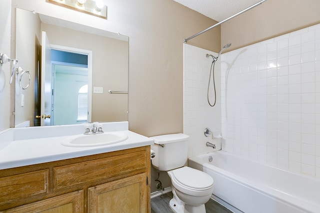 1605 Amberton Pkwy, San Angelo, TX 76901 - bathroom with toilet, bathtub / shower combination, and vanity